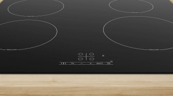 Индукционная варочная поверхность Bosch PUE61RBB6E