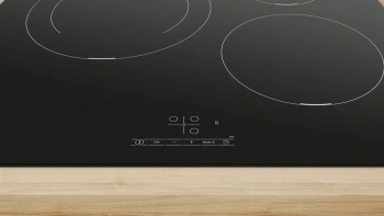Индукционная варочная поверхность Bosch PUJ611BB5E